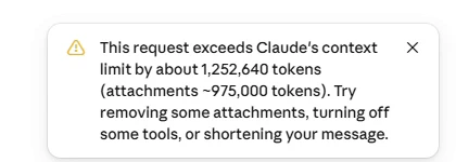 Claude warning after pasting a 50,000-row sheet: this request exceeds Claude's context limit by about 1,252,640 tokens (attachments about 975,000 tokens)